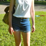 Riflebird member Brianna Haupt is a super cutie in her high waisted cutoff shorts and polka dot tank top.
